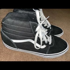 Black and white Vans sneakers